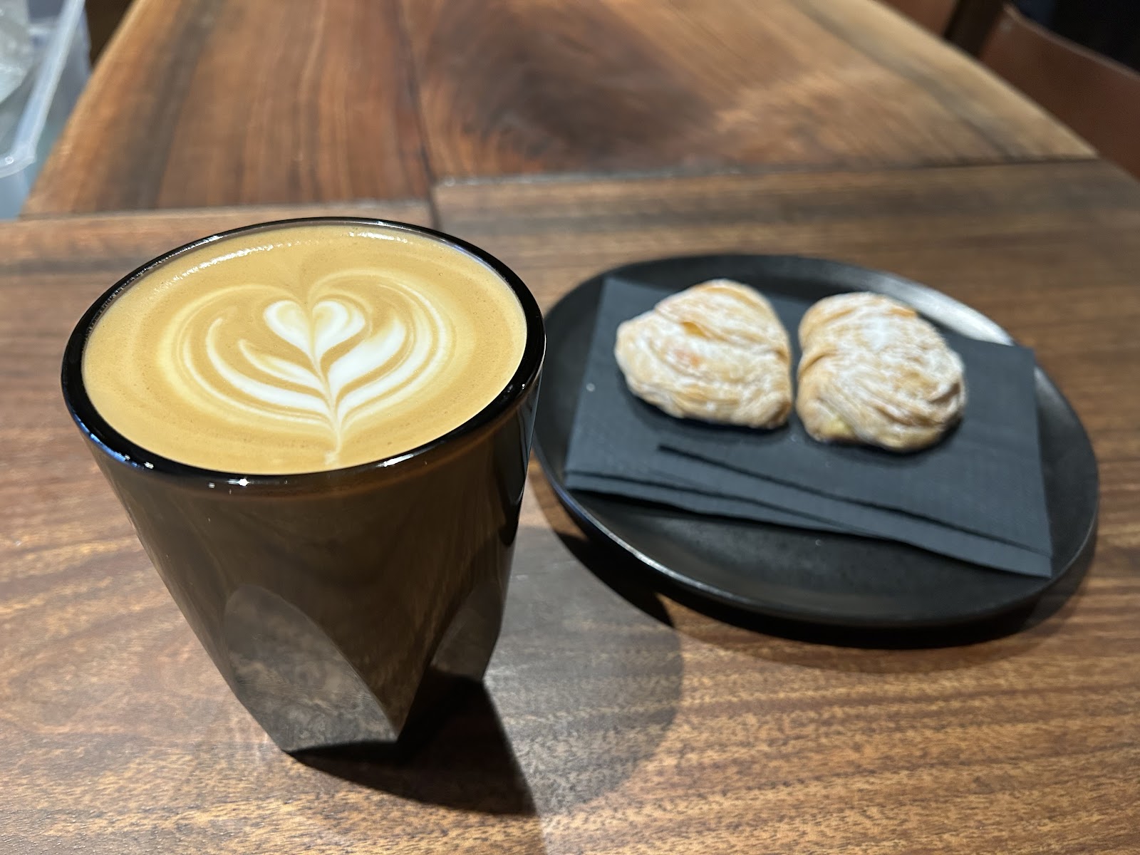 Latte art and palmier pastry