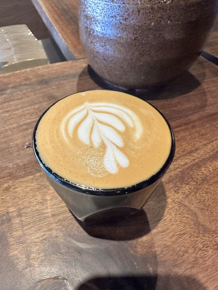 Cortado closeup on wood surface